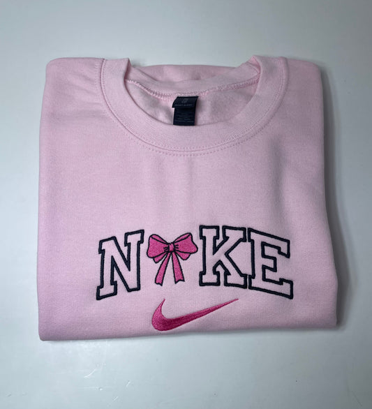 Long sleeve pink bow crewneck sweater