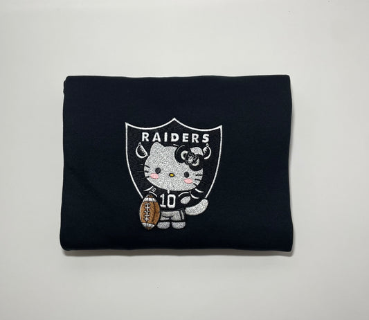 hello kitty X raiders long sleeve crewneck sweater